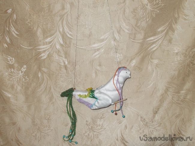 Игрушка «райская птица», сделанная по рисунку ребёнка