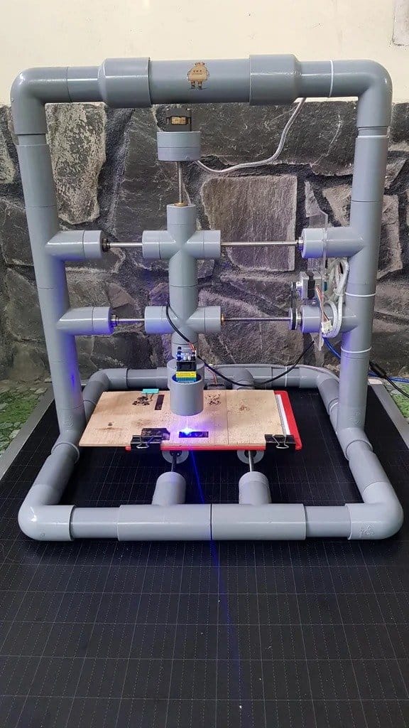 A laser engraver and pen plotter from readily available materials